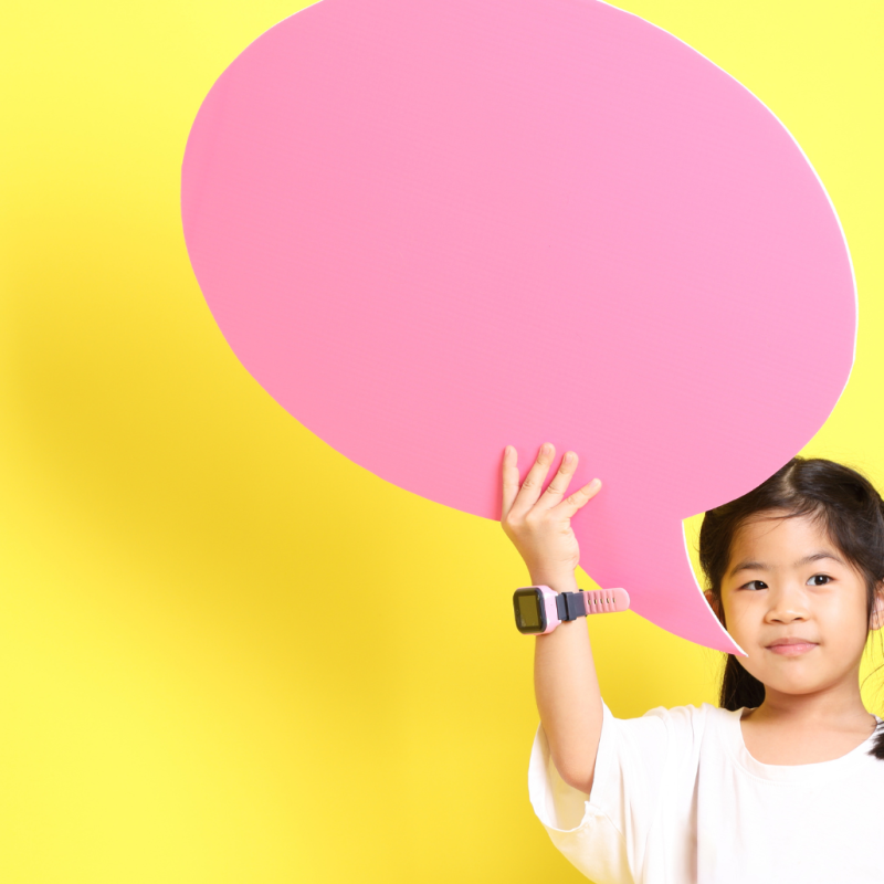 Child holding blog logo