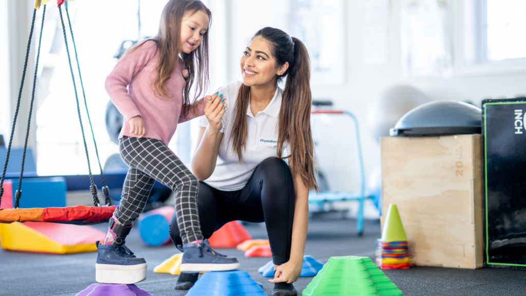 Child working with therapist on motor skills