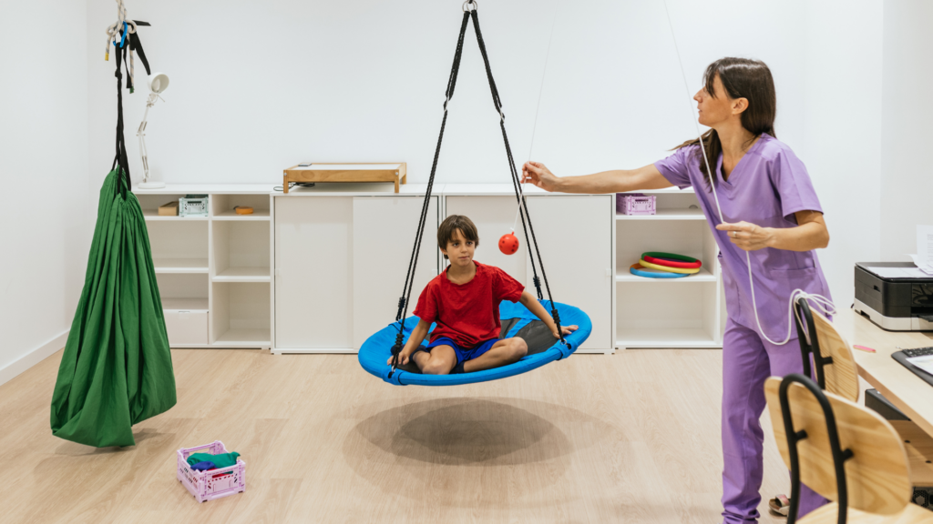 Child working with Pediatric Occupational Therapist