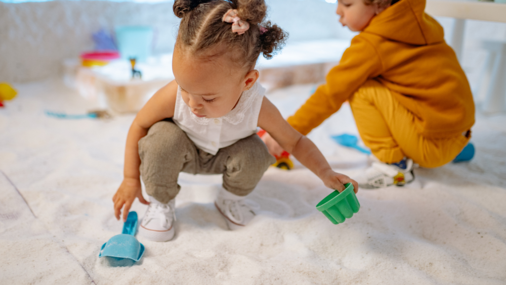 kids playing in a sand pit