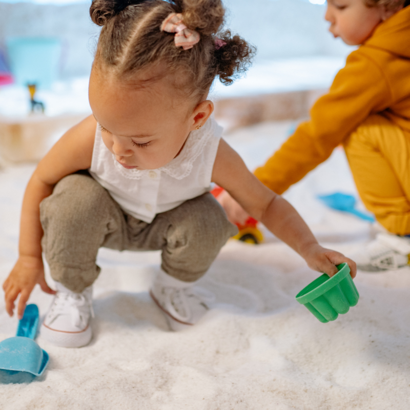 kids playing in a sand pit