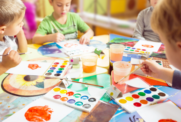 Kid painting together