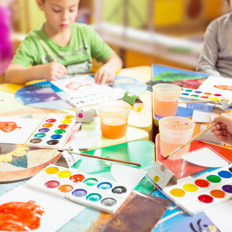 Kid painting together